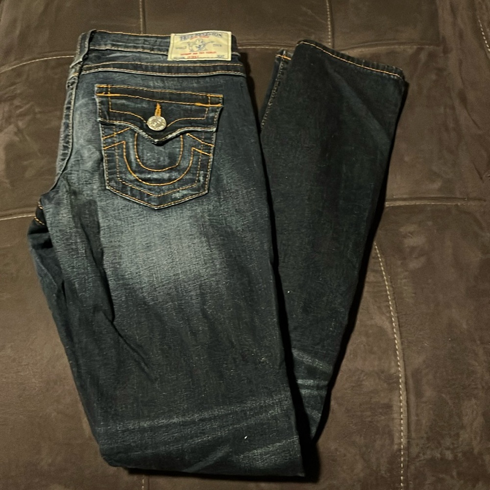 Dark denim with rips